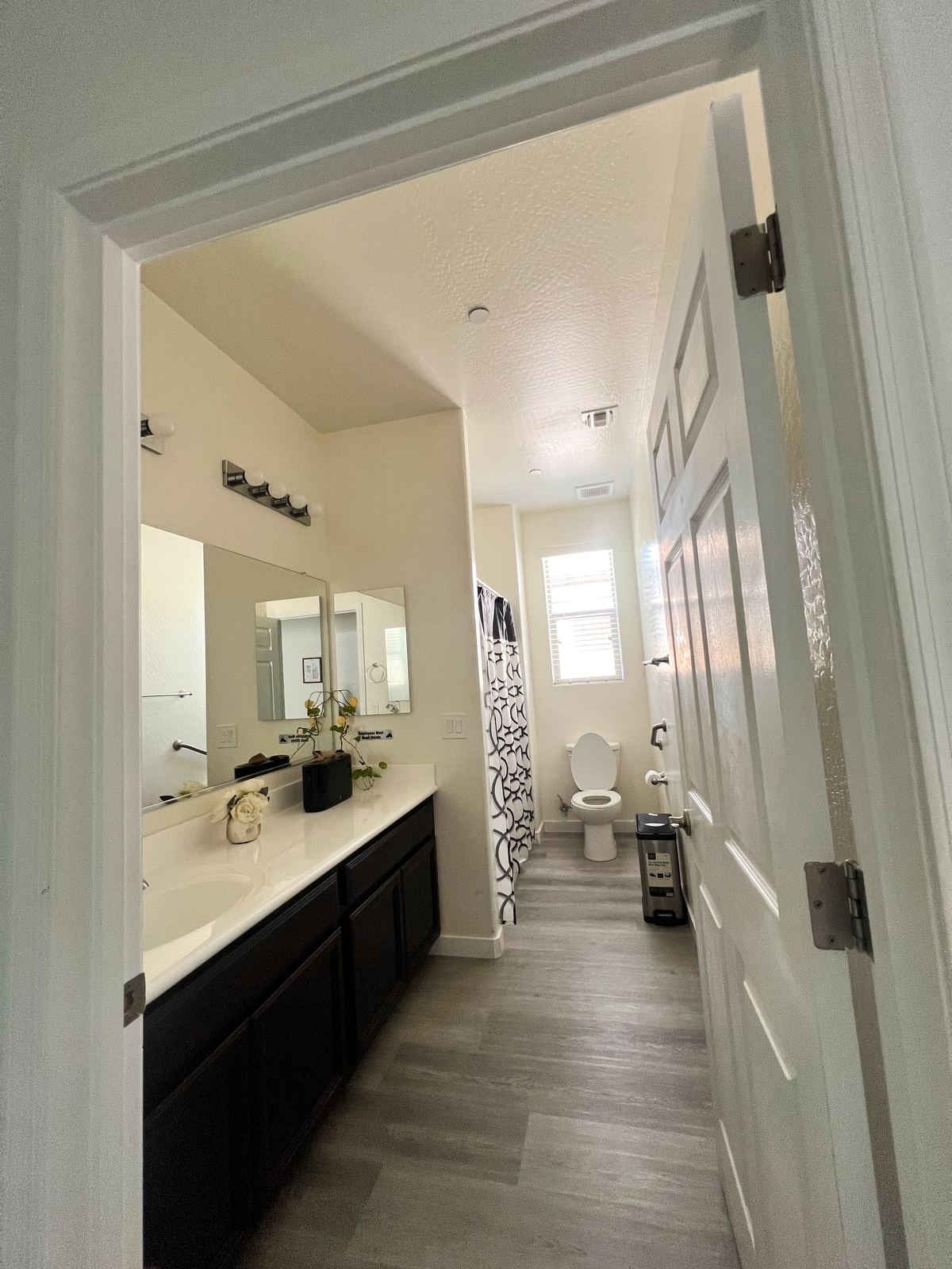 Bathroom view with vanity and doorway