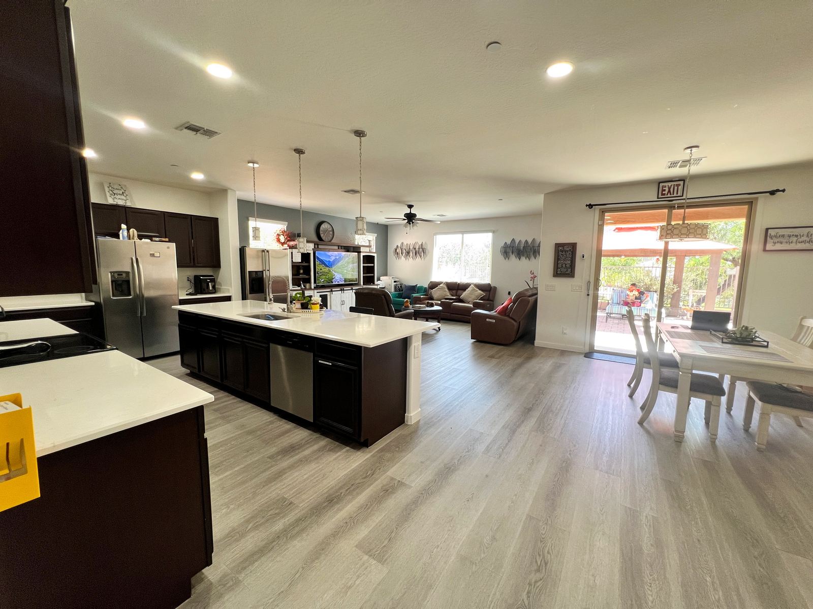 Open living, kitchen, and dining area at Sunnyside Assisted Living